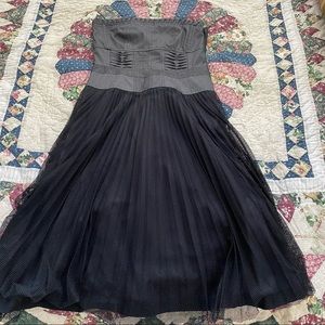 Strapless black denim and pleated skirt tea length dress. Made in USA.